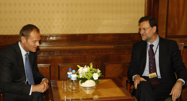 Mariano Rajoy, presidente del PP, y el primer ministro polaco, Donald Tusk