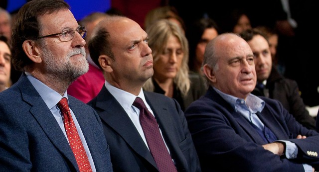 Mariano Rajoy y Jorge Fernández con el ministro italiano del Interior, Angelino Alfano
