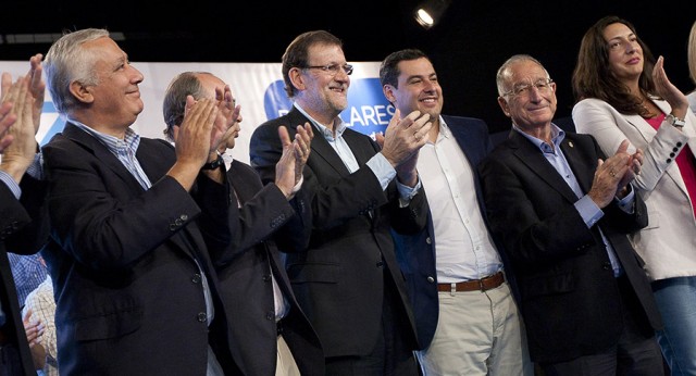 Mariano Rajoy con Javier Arenas y Juanma Moreno