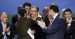 Juanma Moreno abraza a Zoido junto a Mariano Rajoy 