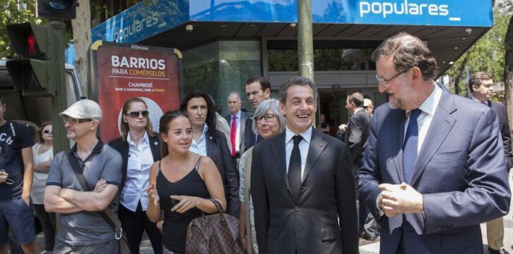 Mariano Rajoy con Nicolas Sarkozy a la salida de Génova